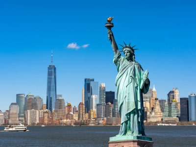 The Statue of Liberty over the Scene of New york cityscape river side which location is lower manhattan,Architecture and building with tourist concept